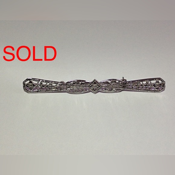 Ladies New 14KT Plumb White Gold Brooch.